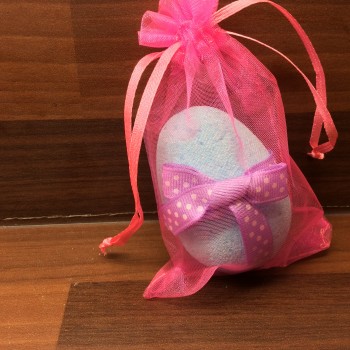 Blue Easter egg in pink bag